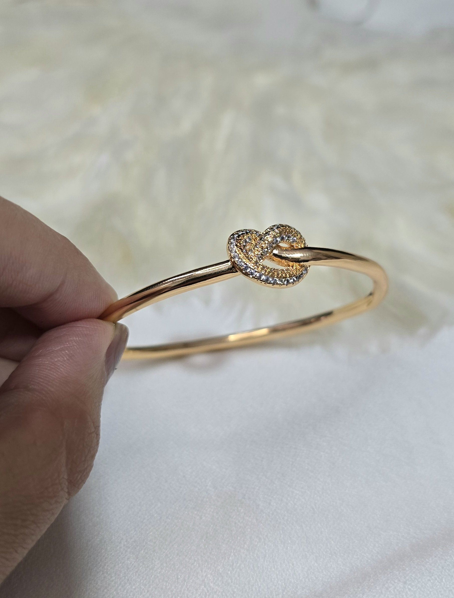 1000094479.jpg دستبند گره ای برند ژوپینگ رنگ ثابت کد 3029 - Image 1